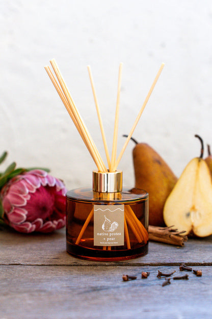 native protea + pear | amber | reed diffuser